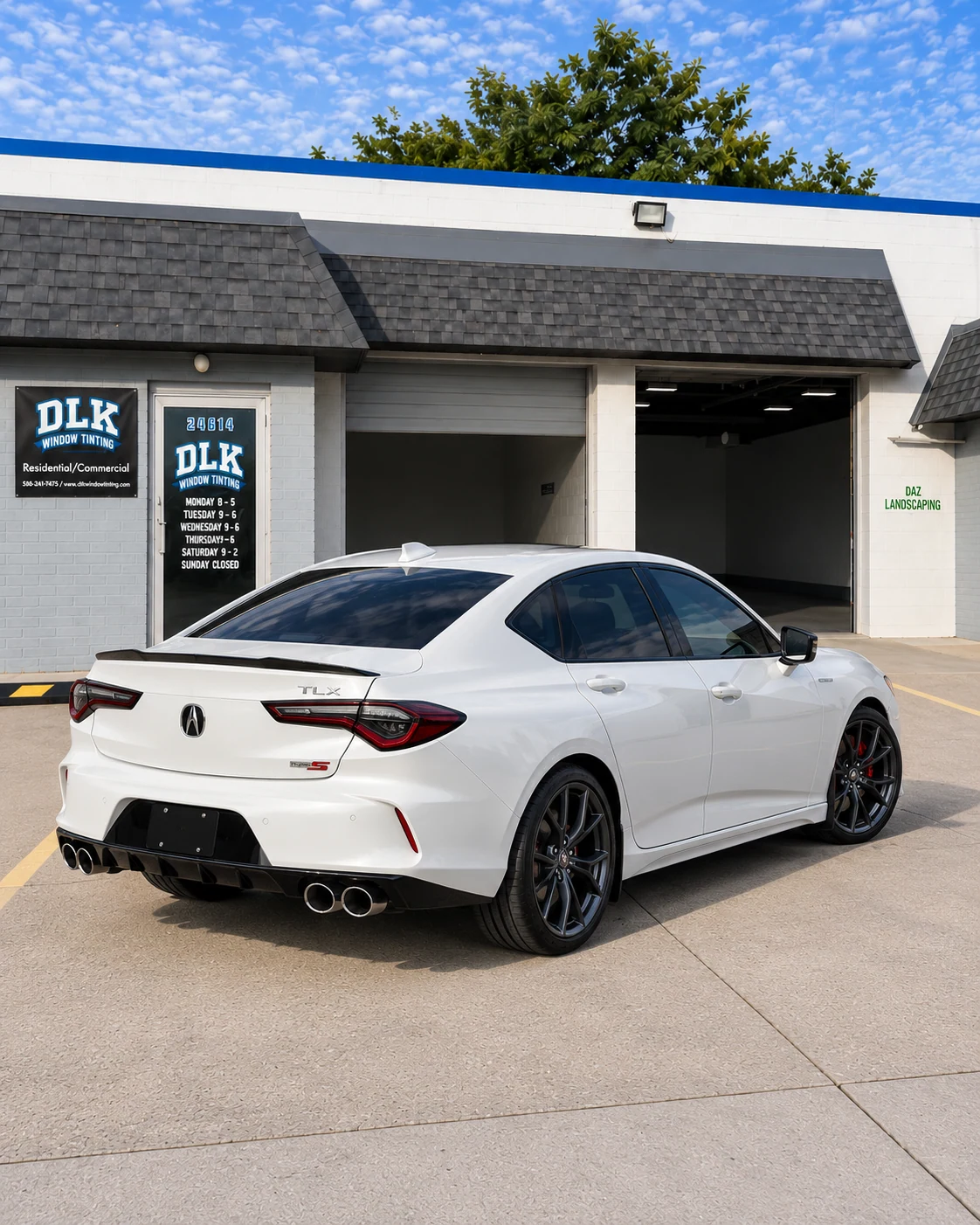 Illustration of a pearl white Acura TLX Type S with tinted windows outside DLK's Mount Clemens shop
