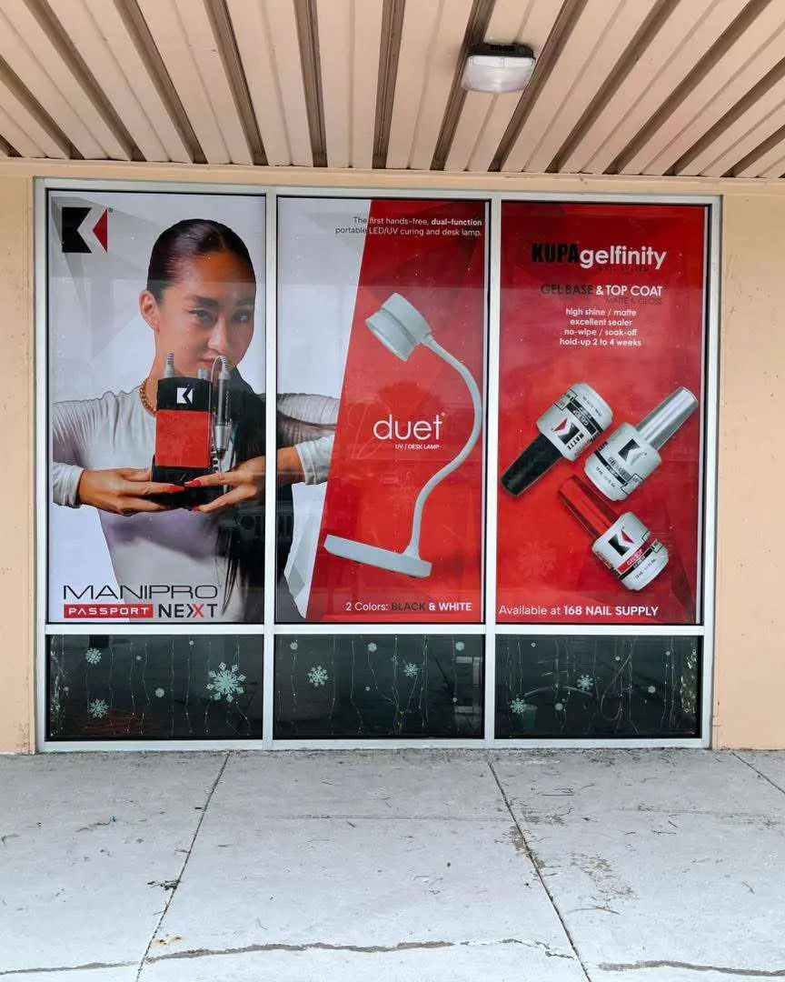 Storefront windows covered with large printed window graphics by DLK Graphics